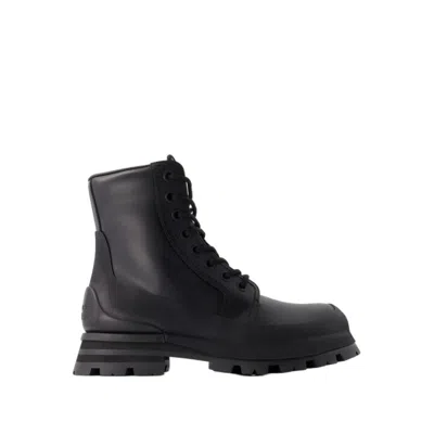 Shop Alexander Mcqueen Wander Ankle Boots - Calfskin - Black