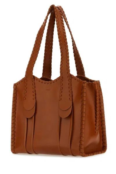 Shop Chloé Chloe Handbags. In Camel