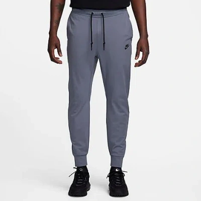 Shop Nike Men's Sportswear Tech Knit Lightweight Jogger Pants In Light Carbon/black
