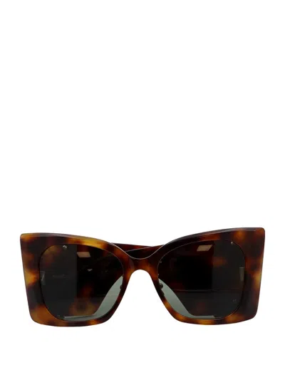 Shop Saint Laurent Sunglasses In Brown