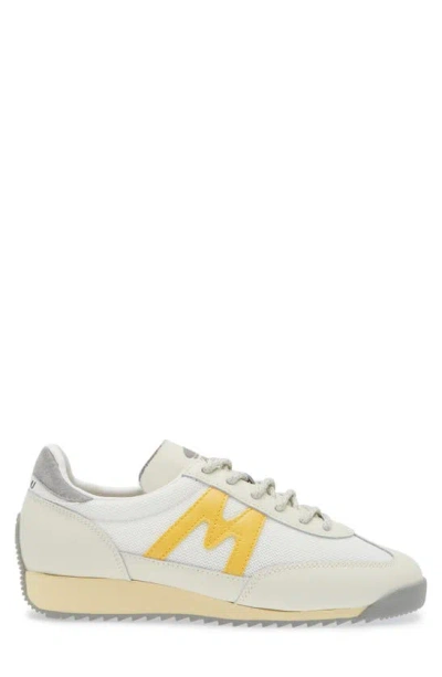 Shop Karhu Gender Inclusive Mestari Sneaker In Lily White/ Banana