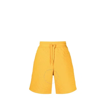 Shop Moschino Men's Yellow Embossed Logo Sweatshorts
