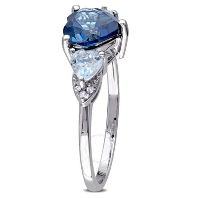 Shop Amour Blue Topaz And Diamond Accent Triple Heart Ring In Sterling Silver In White