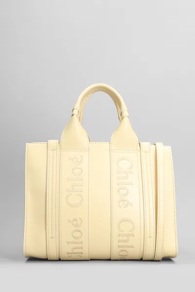 Shop Chloé Woody Tote In Yellow Leather