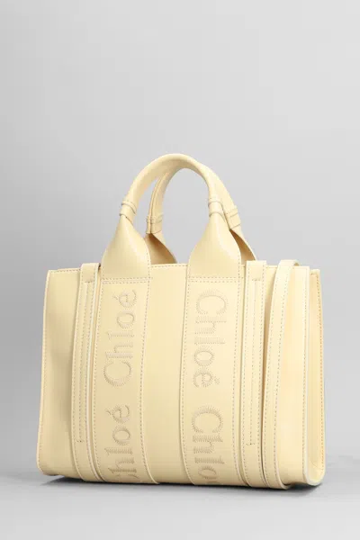 Shop Chloé Woody Tote In Yellow Leather