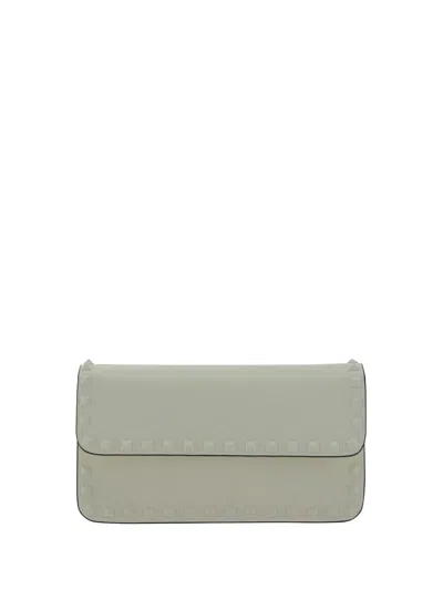 Shop Valentino Garavani Rockstud Handbag In Ivory