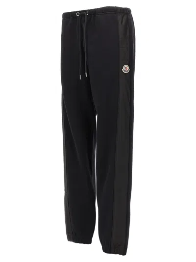 Shop Moncler Logo Joggers In Black