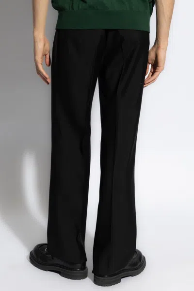 Shop Burberry Pleat-front Trousers In Black