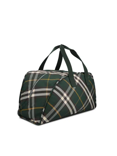 Shop Burberry Large Shield Check-pattern Zipped Duffle Bag In Green