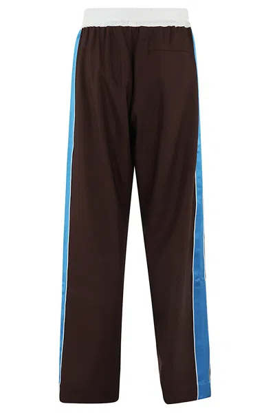 Shop Wales Bonner Courage Trousers In Dark Brown And Blue