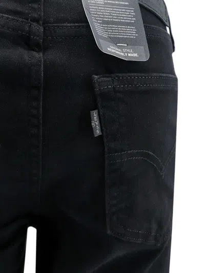 Shop Levi's 725 High Rise Boot-cut Jeans In Black