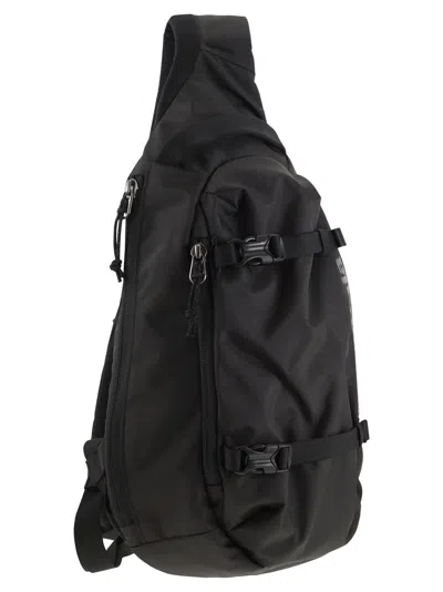 Shop Patagonia Atom Sling - Backpack In Black