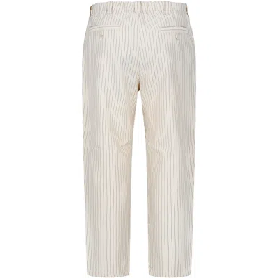 Shop Emporio Armani Ivory Trousers For Boy With Eagle