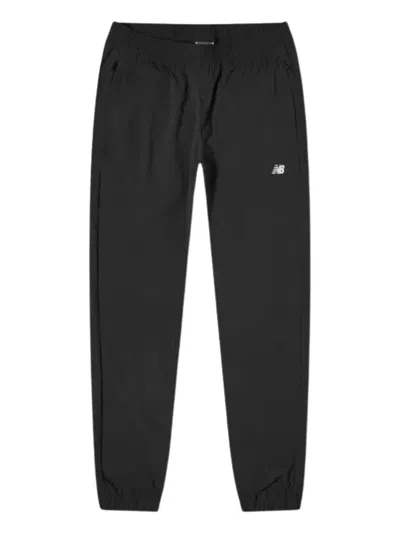 Shop New Balance Athletics Stretch Woven Jogger Clothing In Black