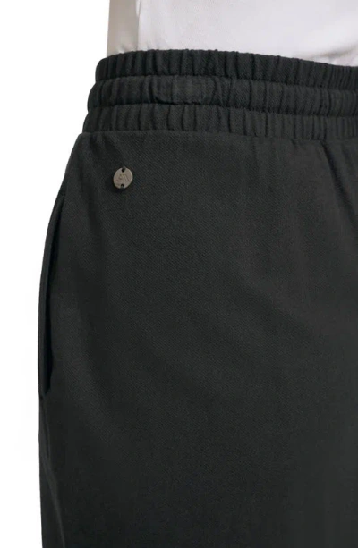 Shop Andrew Marc Twill Faux Wrap Skirt In Black