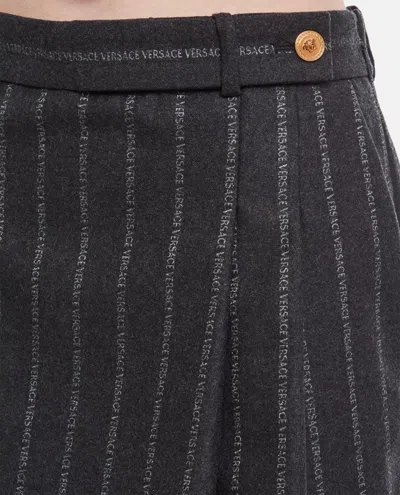 Shop Versace Pleated Striped Miniskirt In Grey