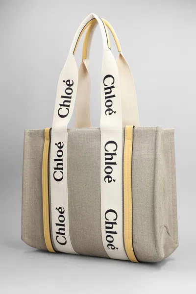 Shop Chloé Woody Tote In Beige Canvas