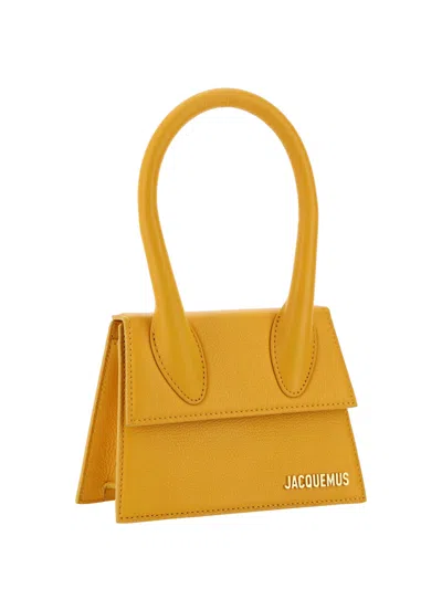 Shop Jacquemus Le Chiquito Moyen Handbag In Dark Orange