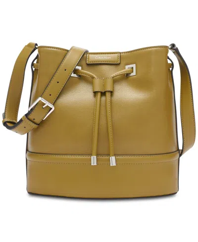 Shop Calvin Klein Ash Drawstring Adjustable Bucket Bag In Olive Branch