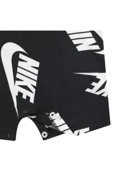 Shop Nike Futura Swoosh Print Romper In Black