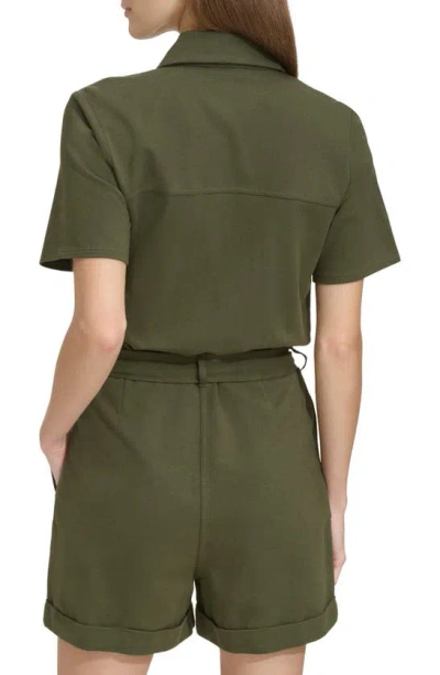 Shop Andrew Marc Sport Knit Twill Romper In Forest Green