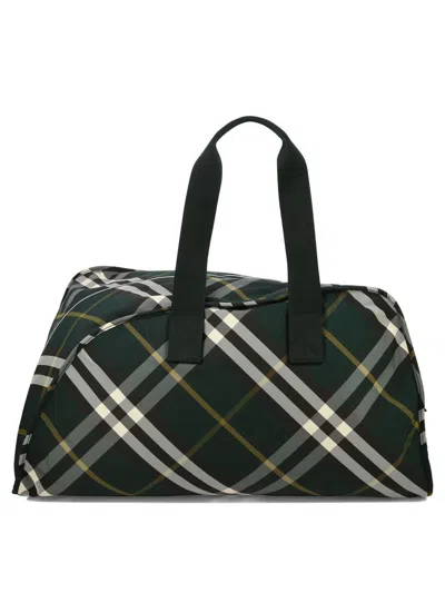 Shop Burberry "large Shield" Duffle Bag In Green