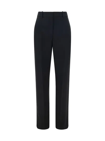 Shop The Row Pants In Black