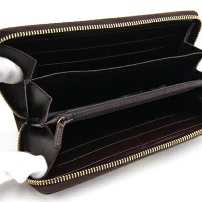 Shop Gucci Zip Around Brown Leather Wallet  ()