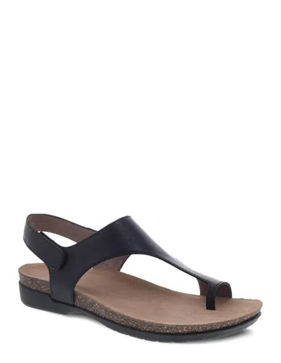 Shop Dansko Reece Waxy Sandals In Black