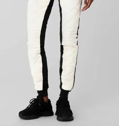 Shop Alo Yoga Airbrush Winter Warm High-waist Moto Puffer Pant In Black/ivory In White