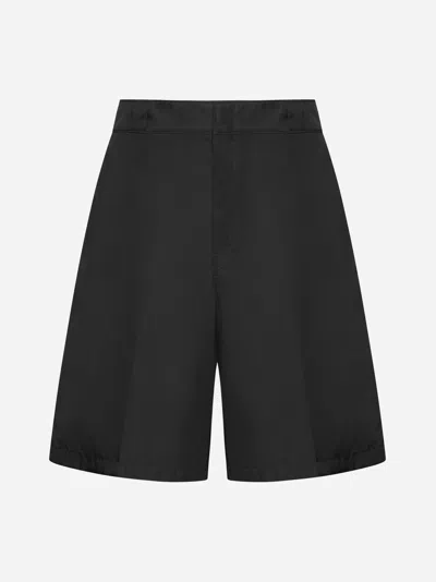 Shop Prada Re-nylon Shorts In Black