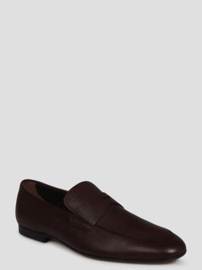 Shop Tod's Grained Leather Loafers In Brown