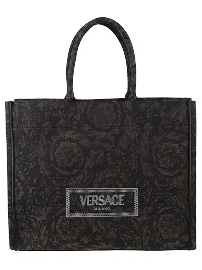 Shop Versace Logo Patch Tote In Black/gold