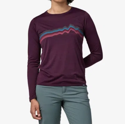 Shop Patagonia Women's Long-sleeved Cool Daily Graphic Shirt In Ridge Rise Stripe/night Plum X-dye In Red