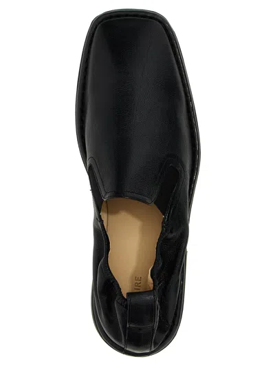 Shop Lemaire Buffalo Leather Loafers In Black