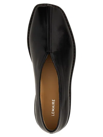 Shop Lemaire Slip On Flat Piped In Black
