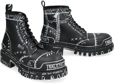 Shop Balenciaga Strike Lace-up Ankle Boots In Black