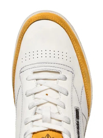 Shop Reebok Vintage Club C Sneakers In White