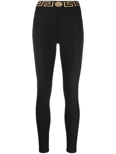 Shop Versace Leggings With Logo Band In Black