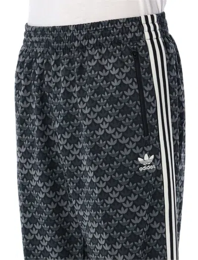 Shop Adidas Originals Monogram Track Pants In Black