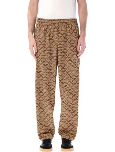 Shop Adidas Originals Monogram Track Pants In Brown