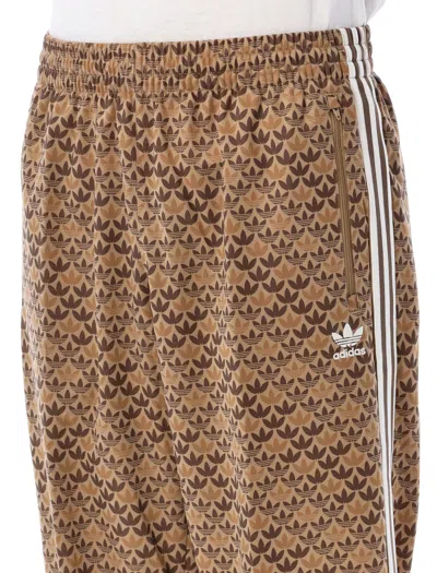 Shop Adidas Originals Monogram Track Pants In Brown