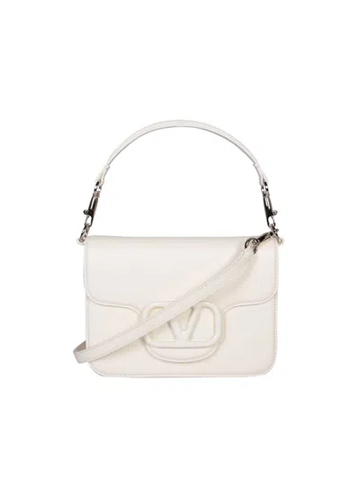 Shop Valentino Loco Ivory Bag In White