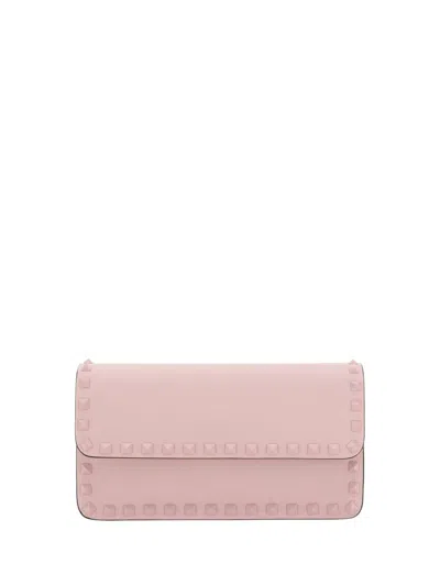 Shop Valentino Garavani Rockstud Foldover Top Clutch Bag In Pink