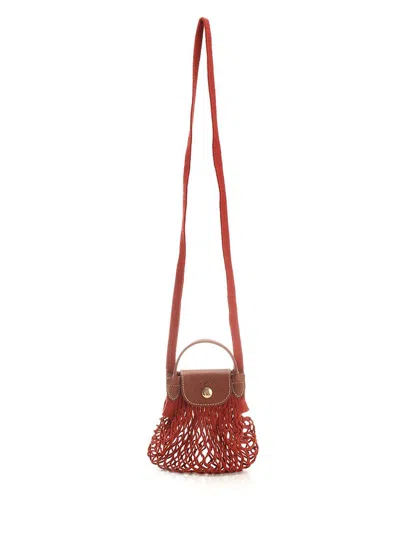 Shop Longchamp Le Pliage Filet Strapped Mini Shoulder Bag In Red