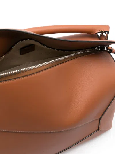 Shop Loewe Puzzle Large Leather Handbag In Brown