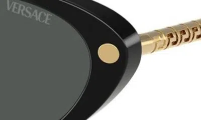 Shop Versace 54mm Oval Sunglasses In Black