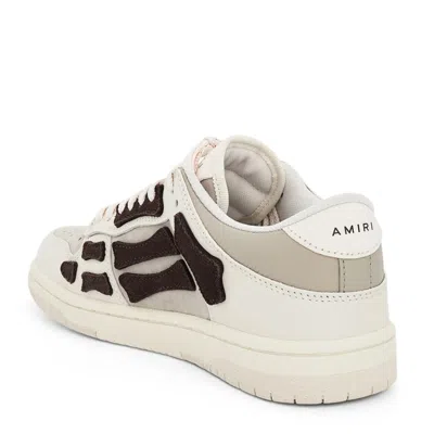 Shop Amiri Sneakers Beige