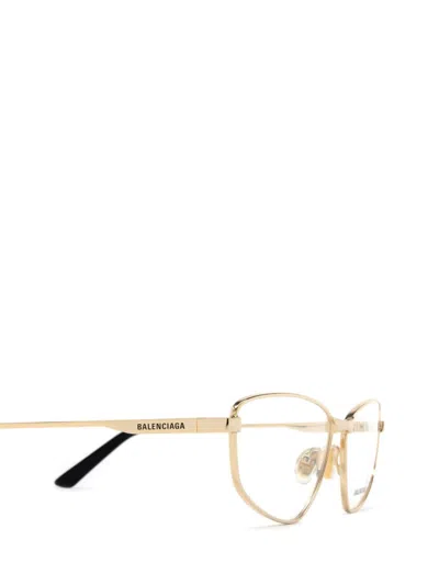 Shop Balenciaga Eyeglasses In Gold