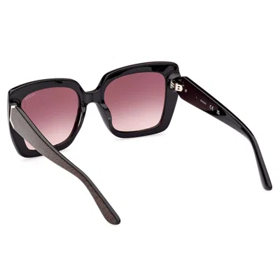 Shop Guess Sunglasses In Black